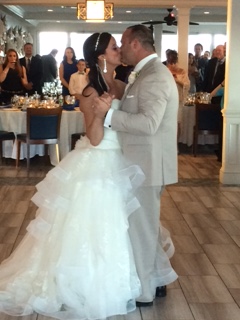 Sarah and Eric enjoy a kiss during their first dance