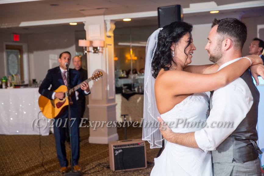 Mike and Angeline's first dance with Gene singing and me looking on